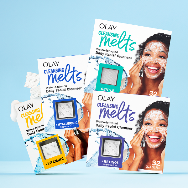 Olay Cleansing Melts packaging with images of women using the product on a light blue background Olay Cleansing Melts packaging with images of women using the product on a light blue background