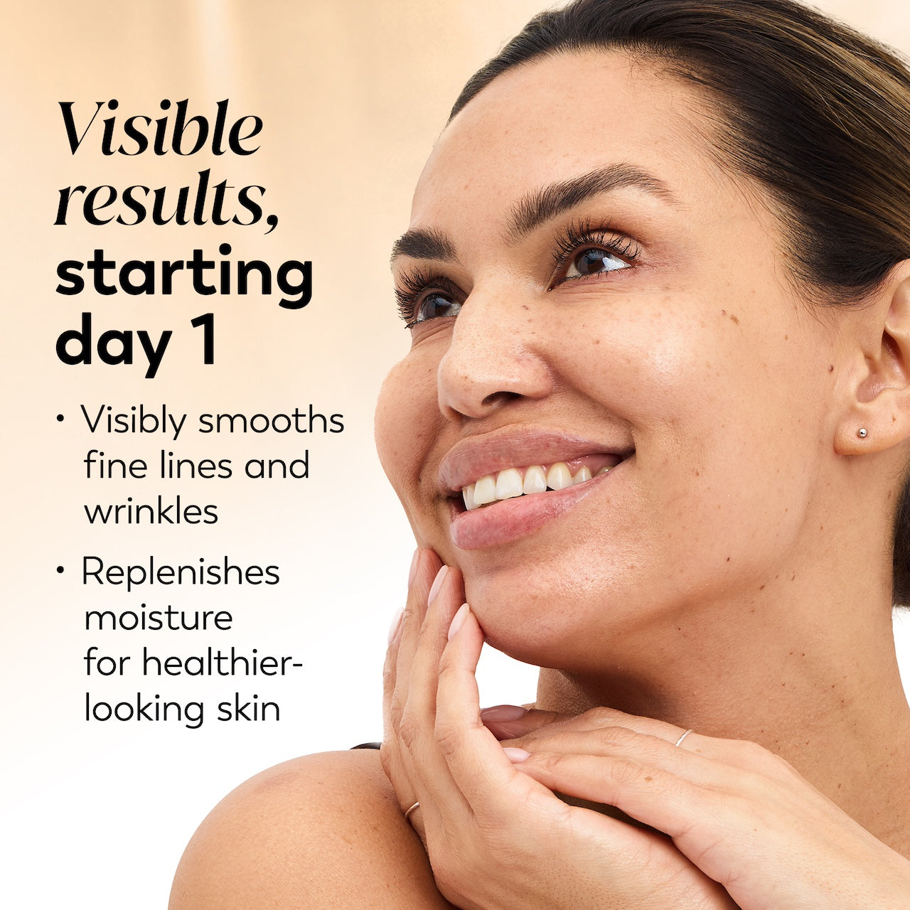 Model posing and smiling. Real results starting day 1. Visibly smooths fine lines. Replenishes moisture for healthier looking skin Model posing and smiling. Real results starting day 1. Visibly smooths fine lines. Replenishes moisture for healthier looking skin