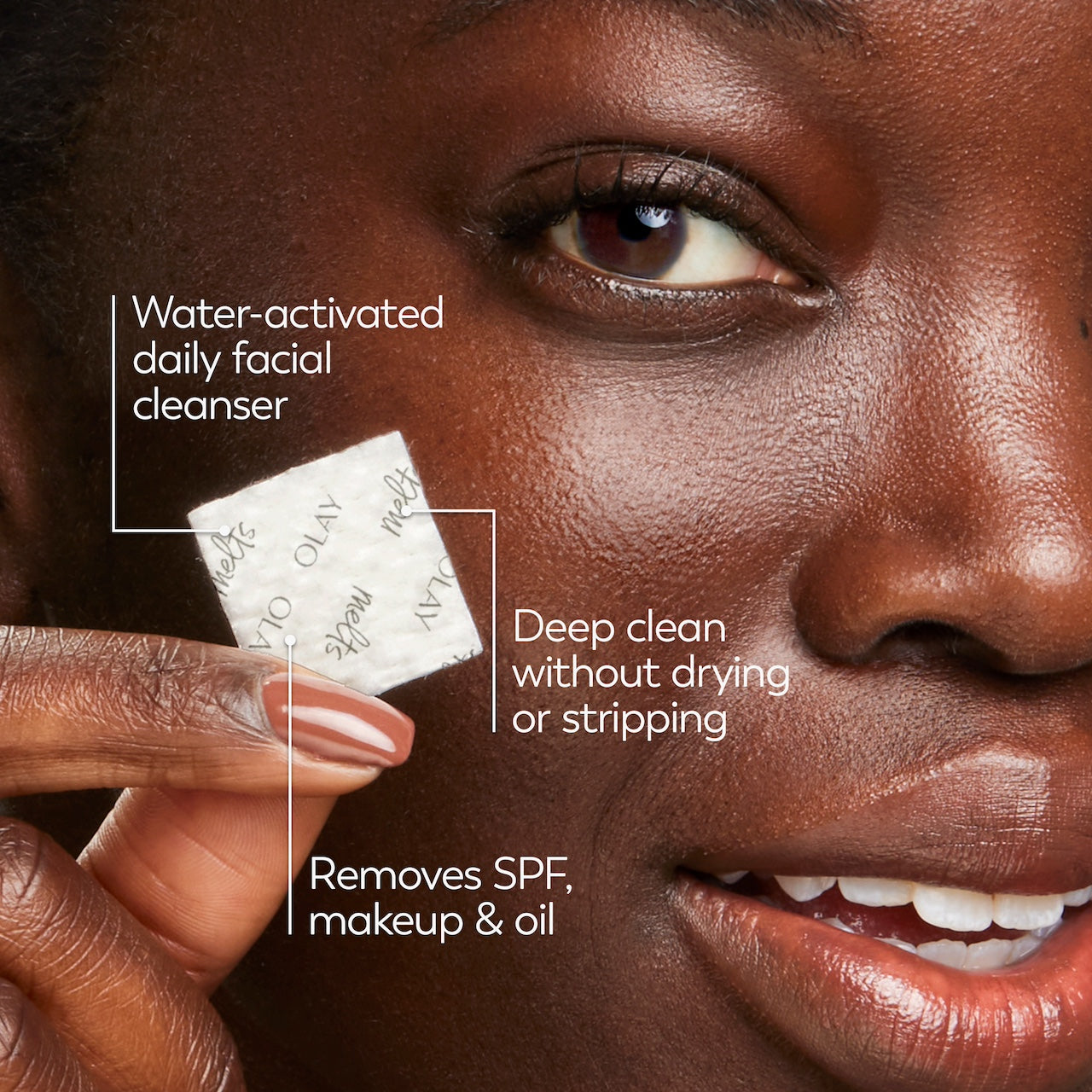 Model holding cleansing melt swatch close to face. Water activated daily facial cleanser. Deep clean without drying or stripping. Removes SPF, makeup and oil. Model holding cleansing melt swatch close to face. Water activated daily facial cleanser. Deep clean without drying or stripping. Removes SPF, makeup and oil.
