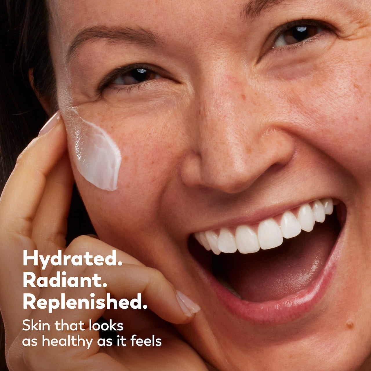 Woman applying cream to her face with text about hydrated, radiant skin. Woman applying cream to her face with text about hydrated, radiant skin.