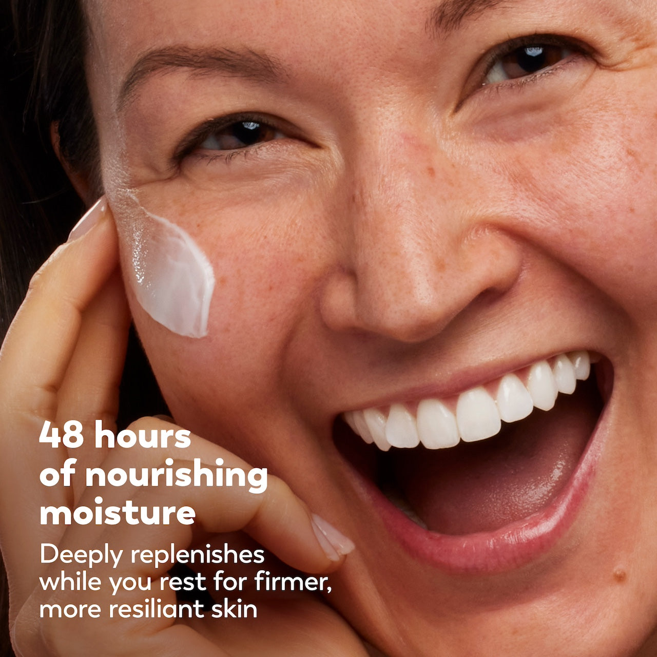 Woman applying cream to her face with a focus on skincare. Woman applying cream to her face with a focus on skincare.
