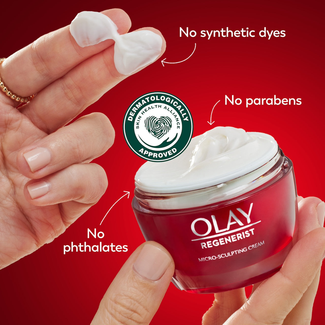 Model dipping fingers in Regenerist Micro-Sculpting Cream Moisturizer. No synthetic dyes, no parabens, no phthalates. Dermatologically approved. Model dipping fingers in Regenerist Micro-Sculpting Cream Moisturizer. No synthetic dyes, no parabens, no phthalates. Dermatologically approved.