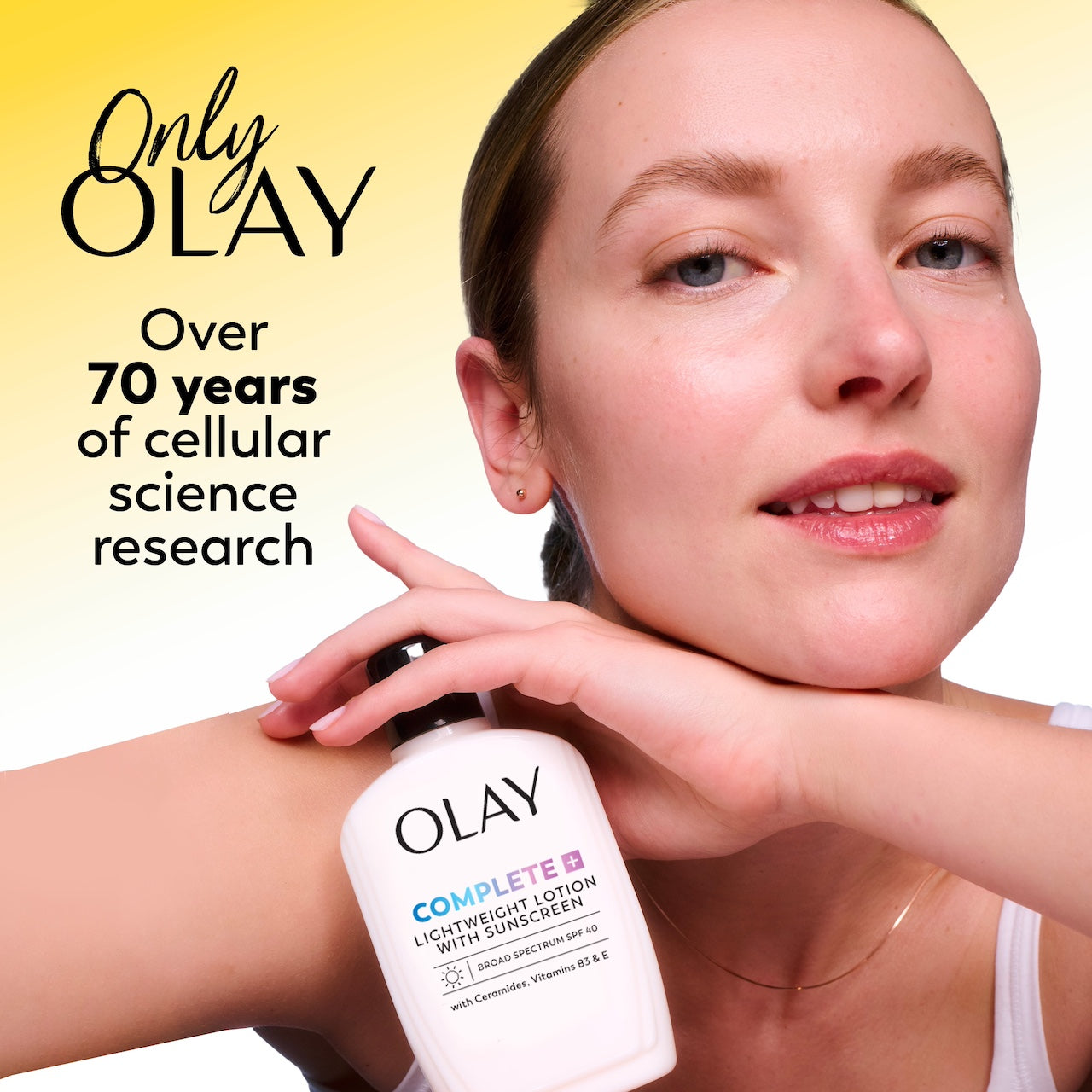 Model posing with Olay Complete Lotion Moisturizer with SPF 15 Sensitive bottle in hand. Only Olay. Over 70 years of cellular science research. Model posing with Olay Complete Lotion Moisturizer with SPF 15 Sensitive bottle in hand. Only Olay. Over 70 years of cellular science research.