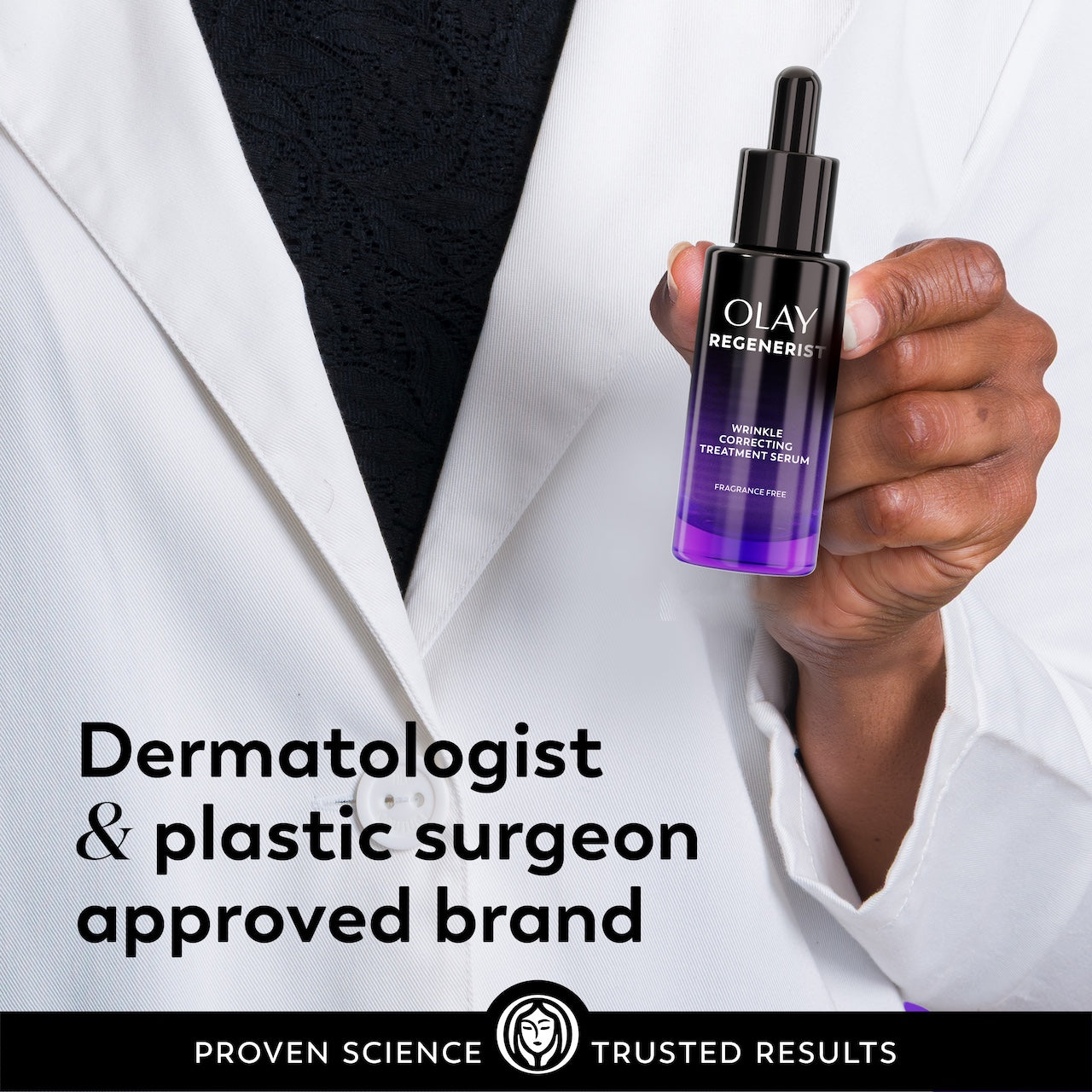 Model posing in lab coat holding Regenerist Wrinkle Correcting Night Treatment bottle. Dermatologist and plastic surgeon approved brand. Model posing in lab coat holding Regenerist Wrinkle Correcting Night Treatment bottle. Dermatologist and plastic surgeon approved brand.
