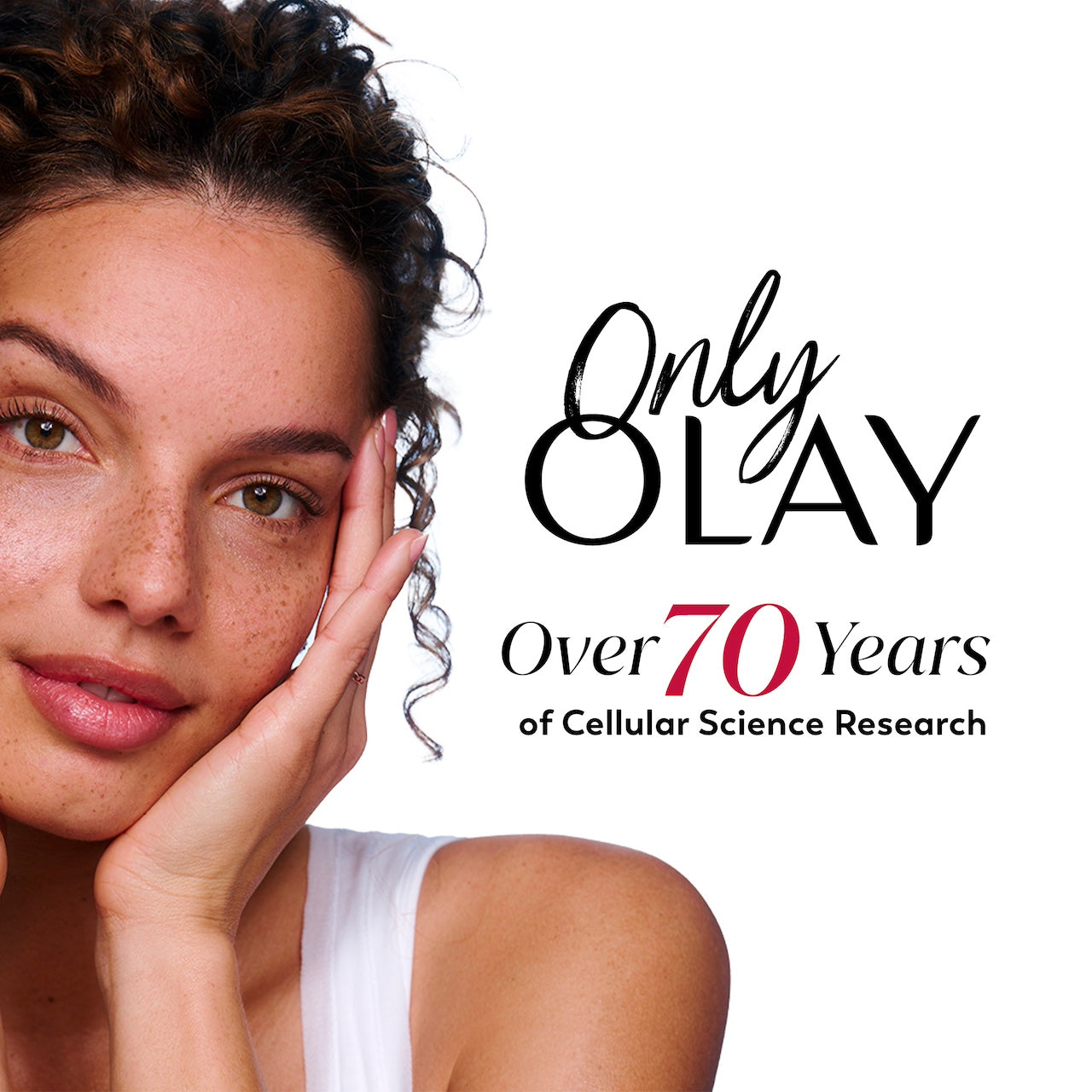 Model posing with hand on face. Only Olay. Over 70 years of cellular science research. Model posing with hand on face. Only Olay. Over 70 years of cellular science research.