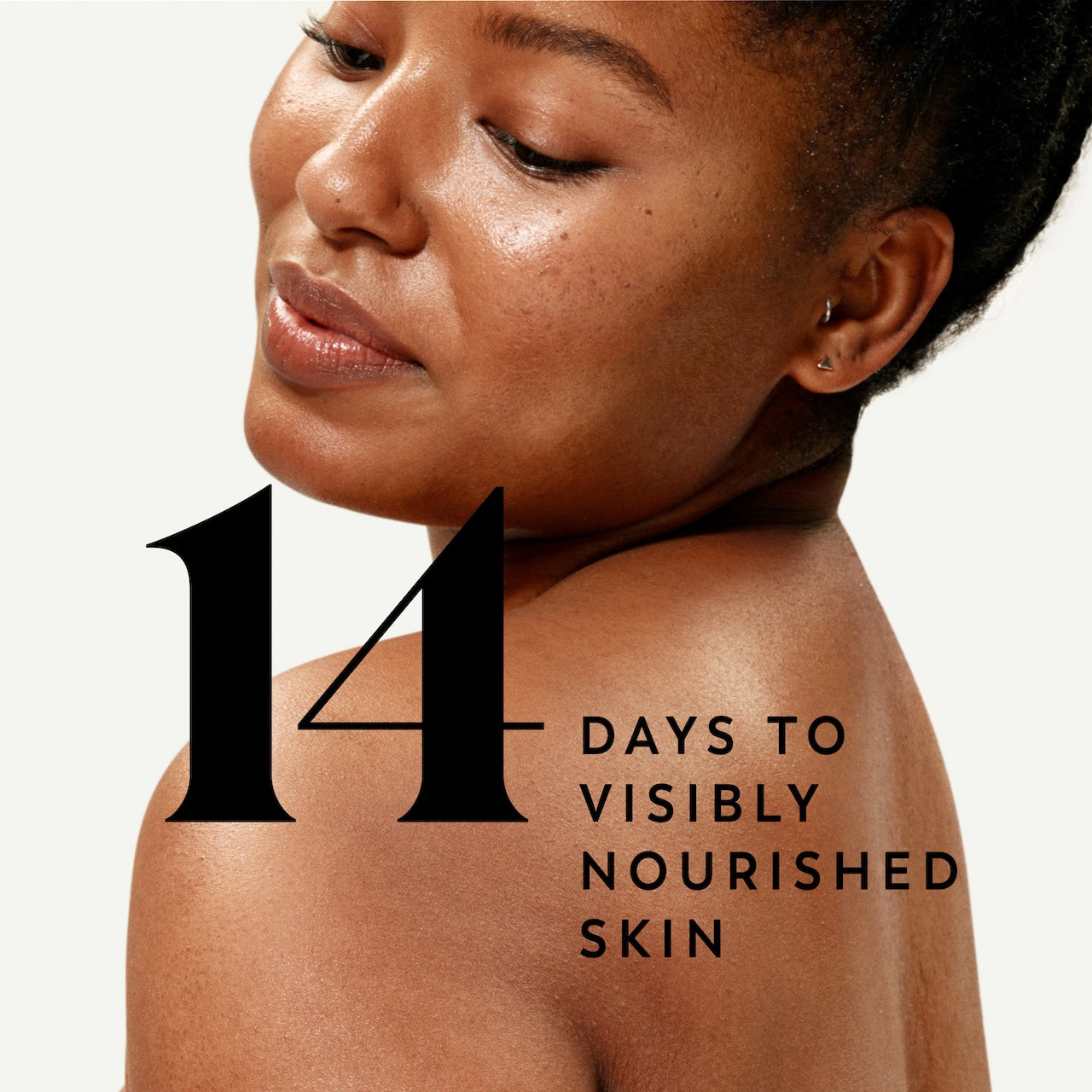 Model posing back facing showing nourished skin. 14 days to visibly nourished skin Model posing back facing showing nourished skin. 14 days to visibly nourished skin