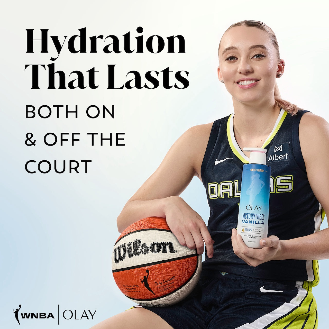 WNBA Player Paige Bueckers posing holidng a basketball and Victory Vibes ntensely Hydrating Body Wash. Hydration that lasts. Both on and off the court WNBA Player Paige Bueckers posing holidng a basketball and Victory Vibes ntensely Hydrating Body Wash. Hydration that lasts. Both on and off the court