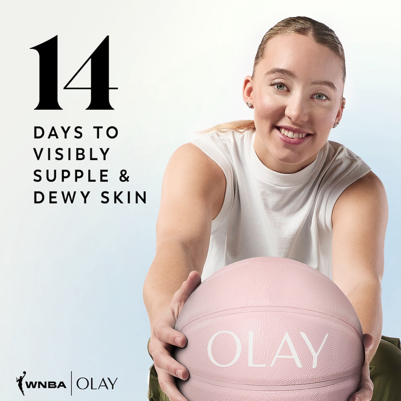 WNBA Player Paige Bueckers posing holidng a basketball smiling. 14 days to visibly supple and dewy skin WNBA Player Paige Bueckers posing holidng a basketball smiling. 14 days to visibly supple and dewy skin