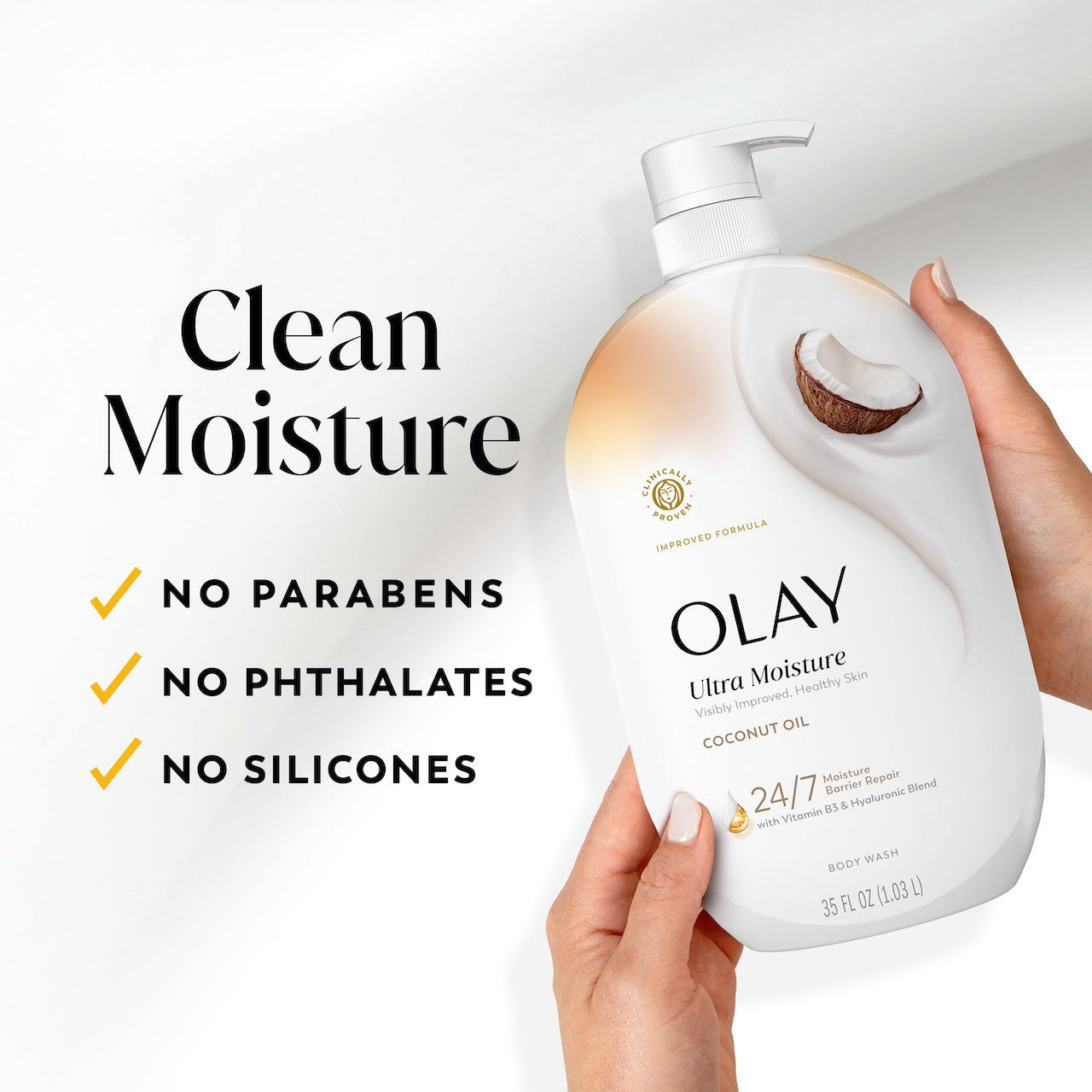 Model holding Olay Ultra Moisture Body Wash. Clean moisture. No prarbens, no phthalates, no silicones Model holding Olay Ultra Moisture Body Wash. Clean moisture. No prarbens, no phthalates, no silicones