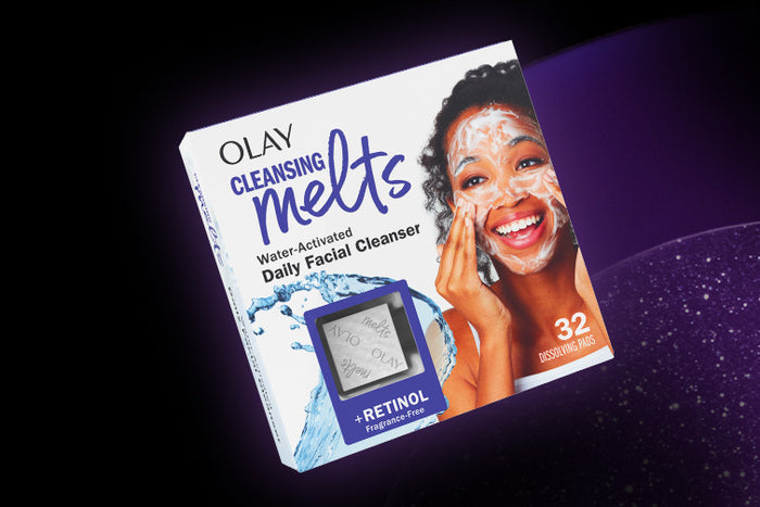 Olay Cleansing Melts with retinol package on a starry background