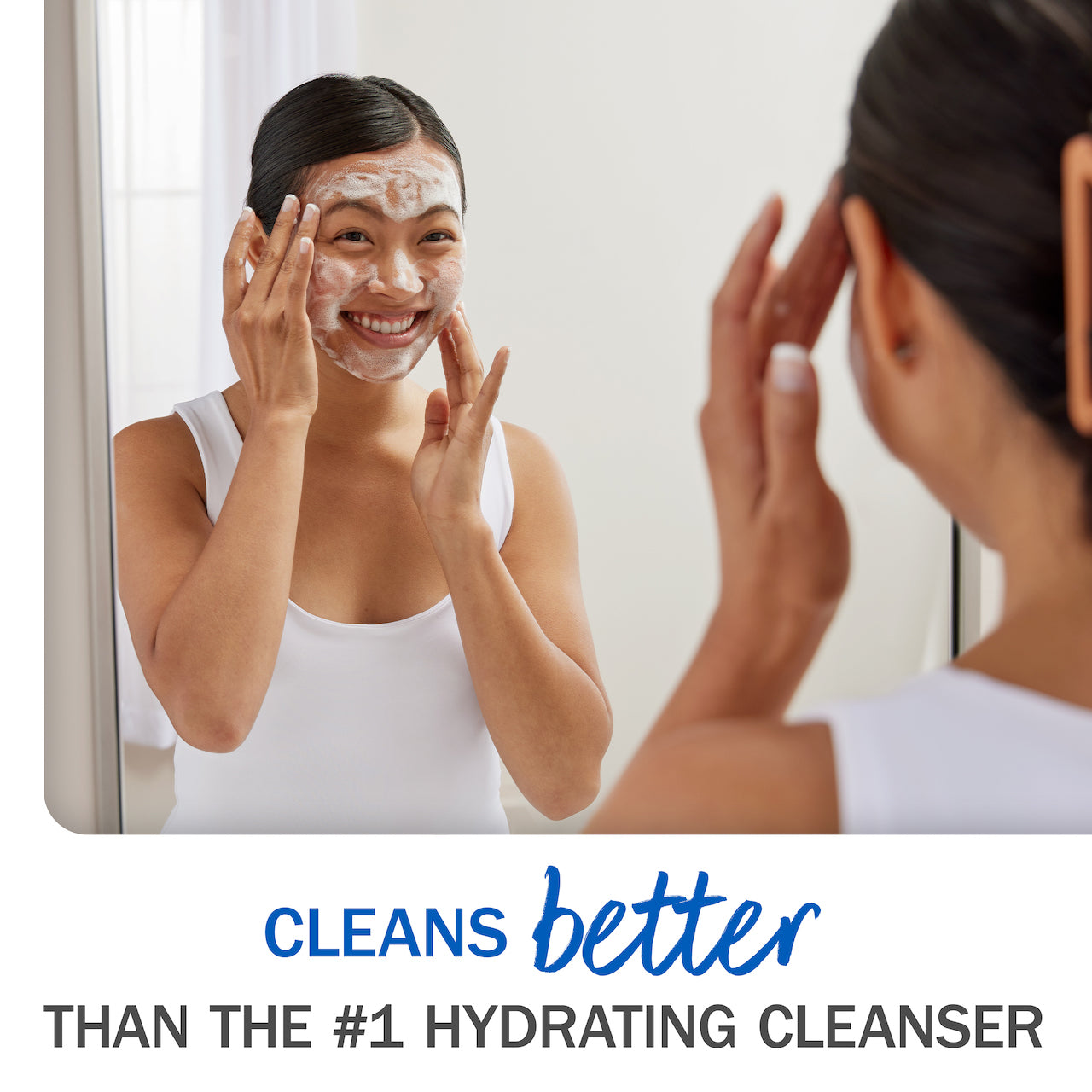 Cleans better than the #1 hydrating cleanser. Model applying Melts cleanser to face.