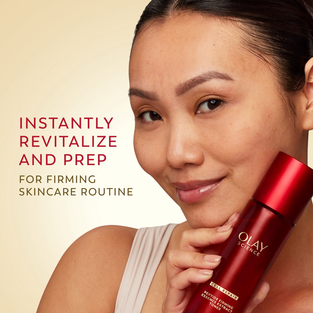 Model posing holding OLAY Magic AA Toner container. Instantly revitalize and prep for firming skincare routine
