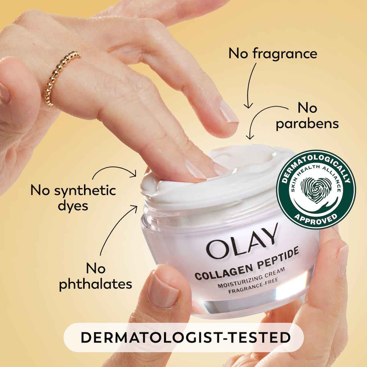 Model dipping fingers in Collagen Peptide Moisturizing Cream. No synthetic dyes, no phthalates, no fragrance, no parabens. Dermatologist tested. Dermatologically approved.