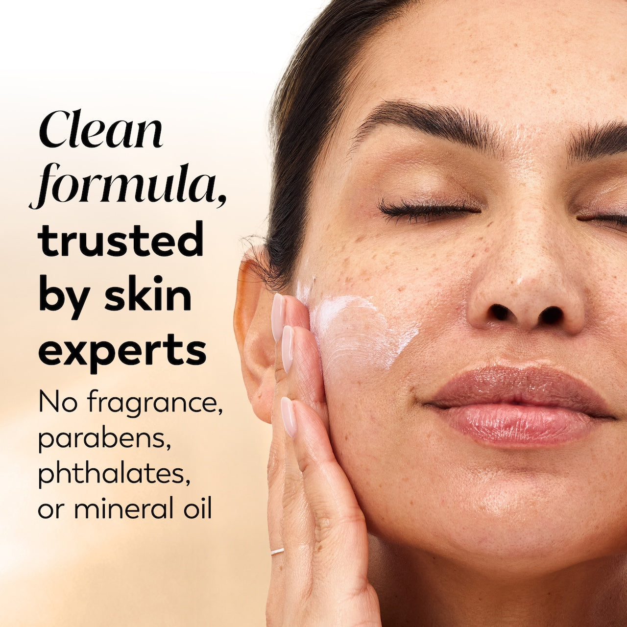 Model posing applying Total Effects Face Moisturizer Fragrance-Free SPF 15 to face. Clean formula, trusted by skin experts. No parabens, phthalates, or mineral oil