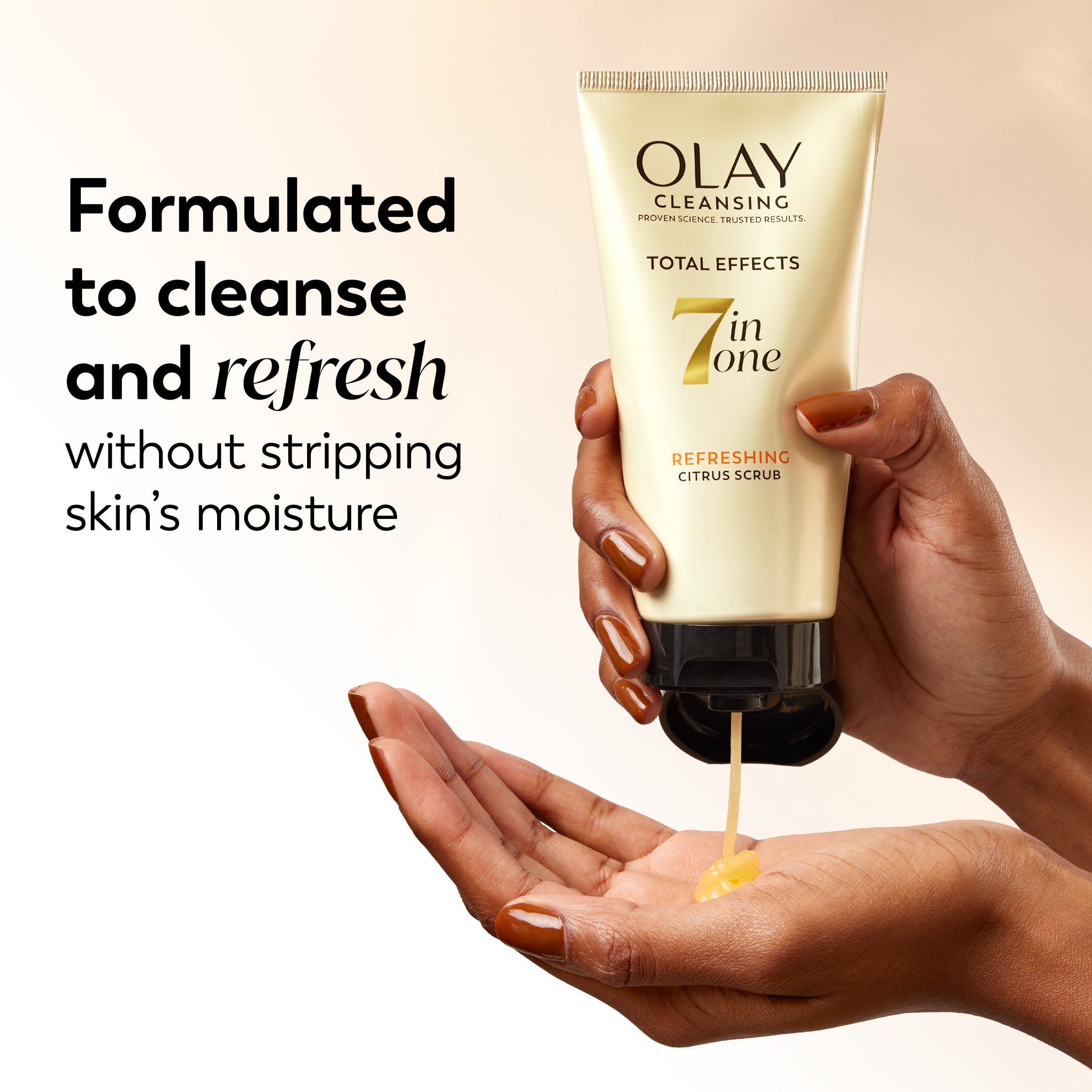Olay cleansing product being applied to a hand with text about skin care benefits. Formulated to cleanse and refresh without stripping skin's moisture.