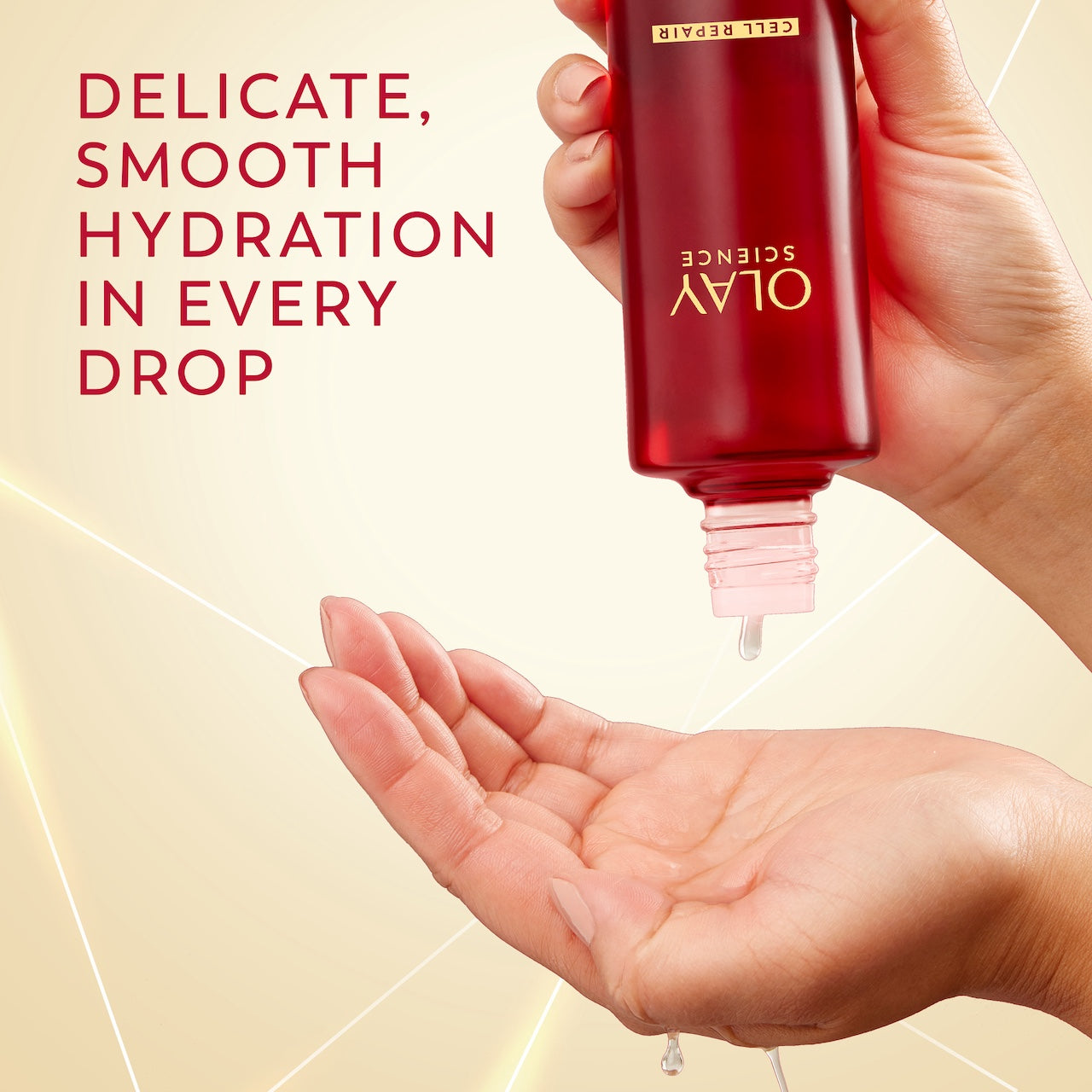 Model pouring OLAY Magic AA Toner in to hand. Delicate smooth hydration inevery drop.