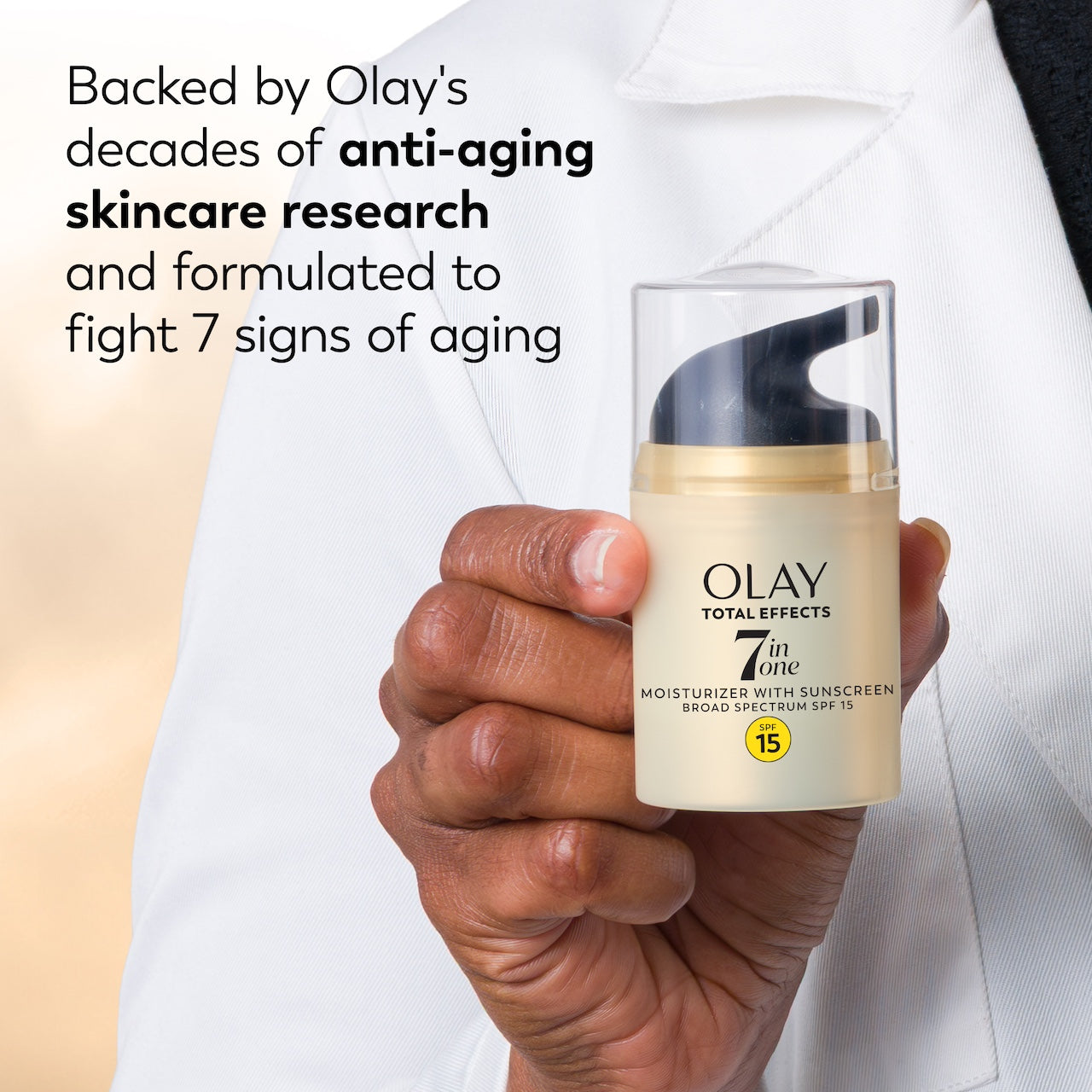Total Effects Face Moisturizer Fragrance-Free SPF 15 bottle in hand. Backed by Olay's decades of anti aging skincare research and formulated to fight 7 signs of aging