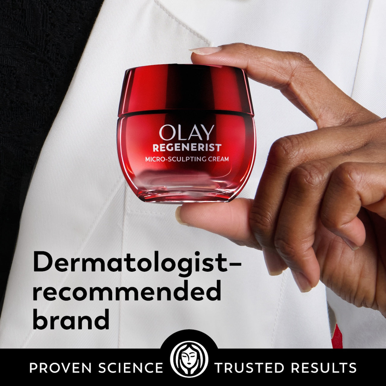 Model holding New Regenerist Micro-Sculpting Cream Moisturizer jar. Dermatologist recommended brand. Proven Science, trusted results.