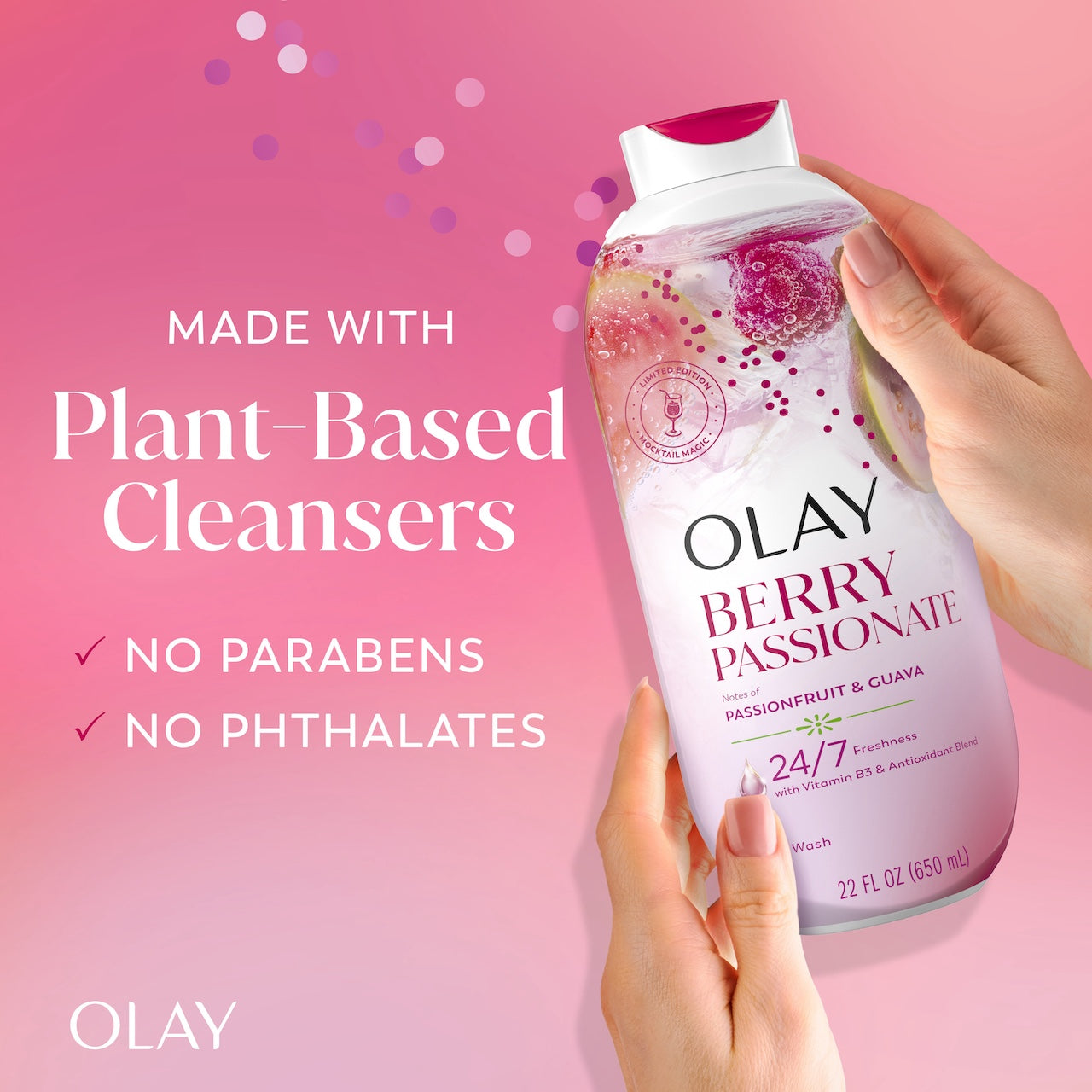 Model holding Olay Berry Passionate Body Wash. Made with plant based cleansers. No parabens no phthalates
