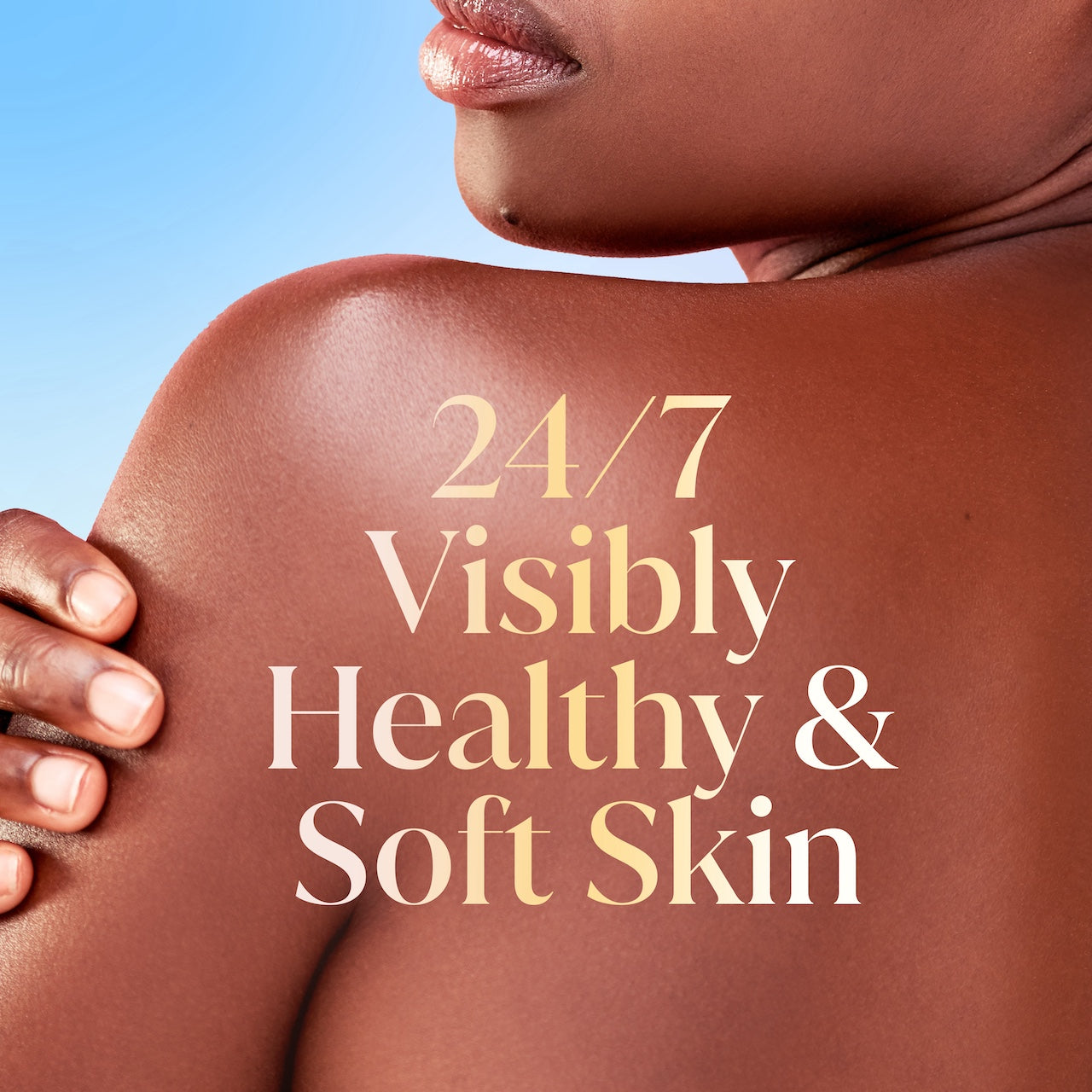 Model posing back facing. 24/7 visibly healtyh and soft skin