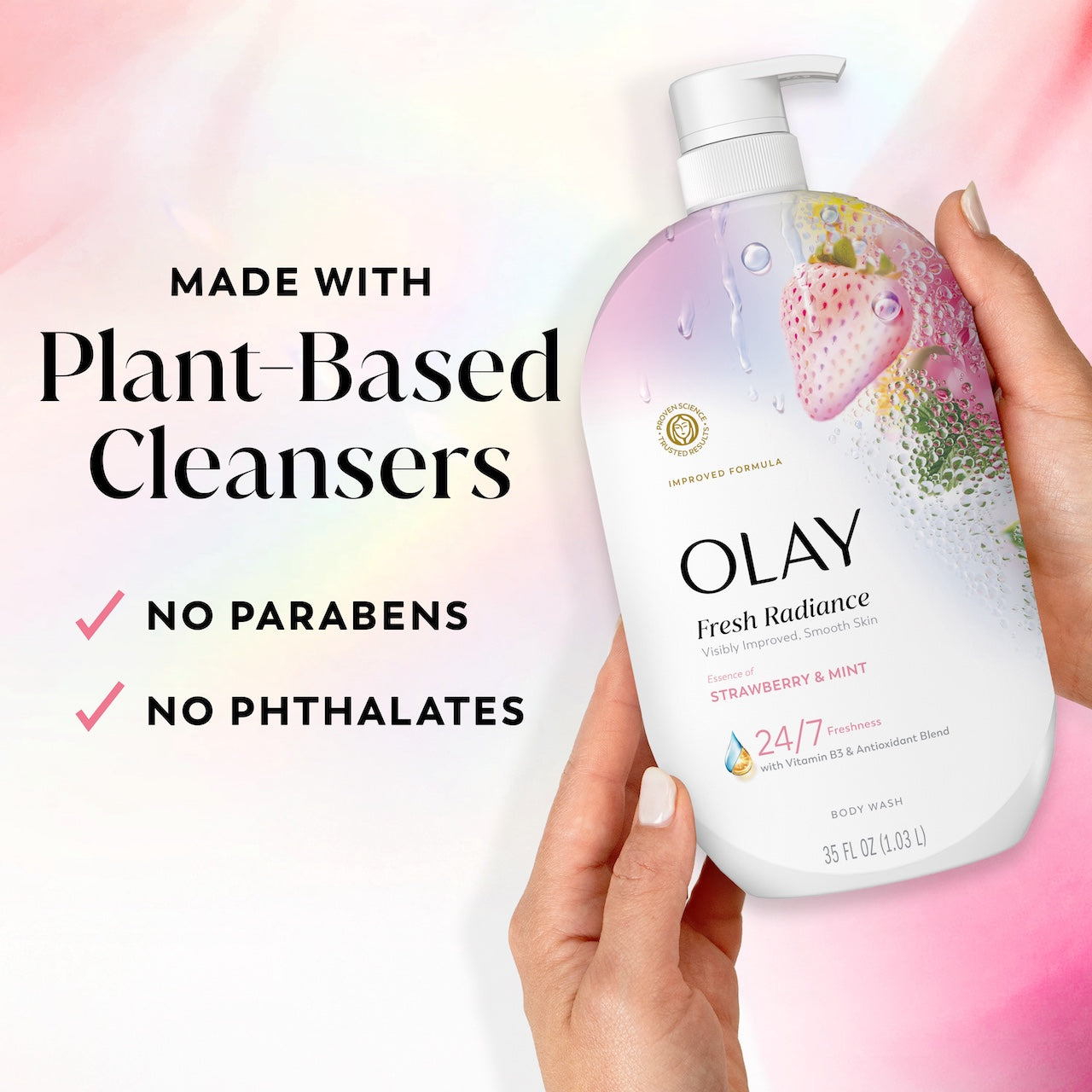 Model holding Fresh Radiance Body Wash bottle. Made with plant based cleansers. No parabens, no phthalates