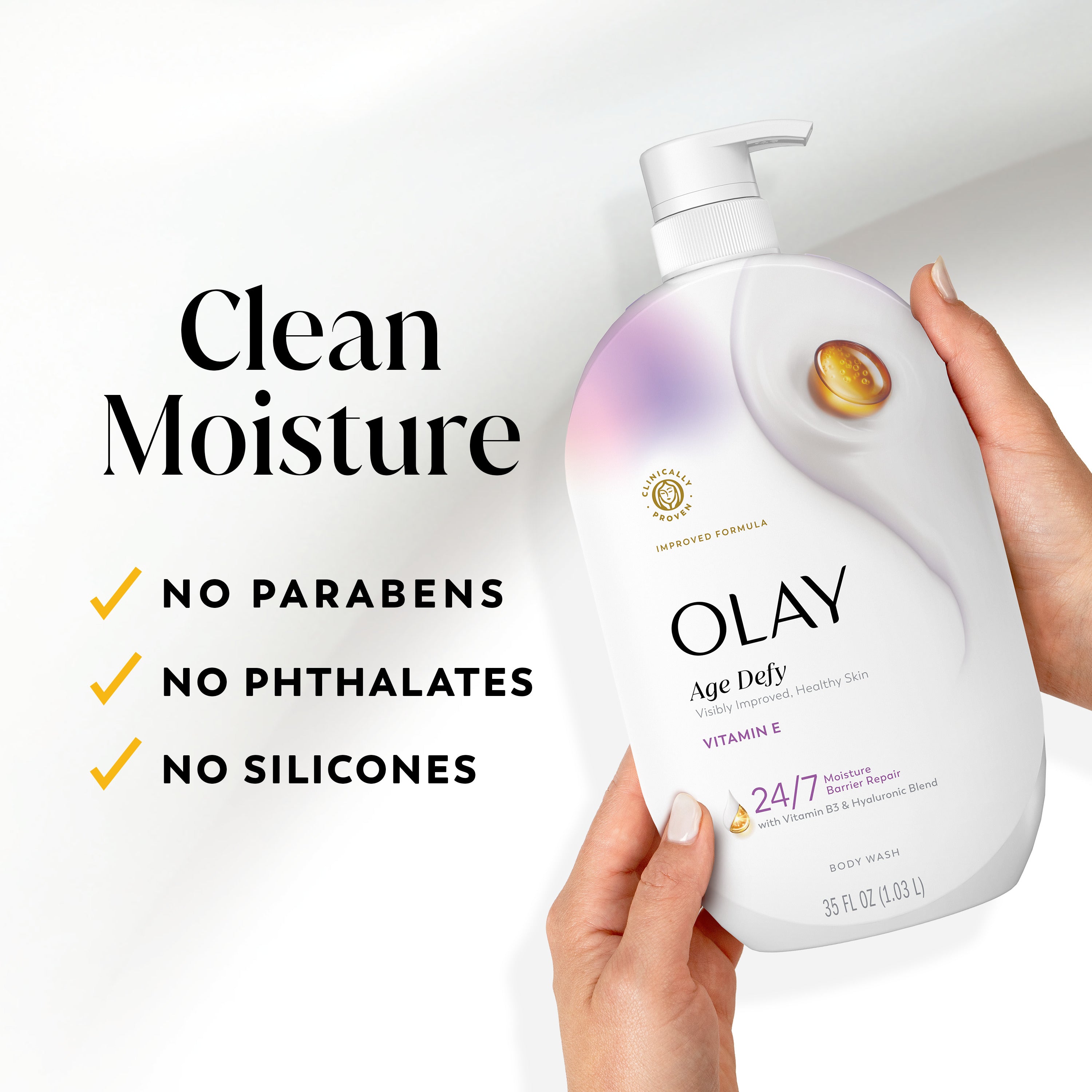 Model holding Olay Ultra Moisture Body Wash, Clean moisture. No prarbens, no phthalates, no silicones