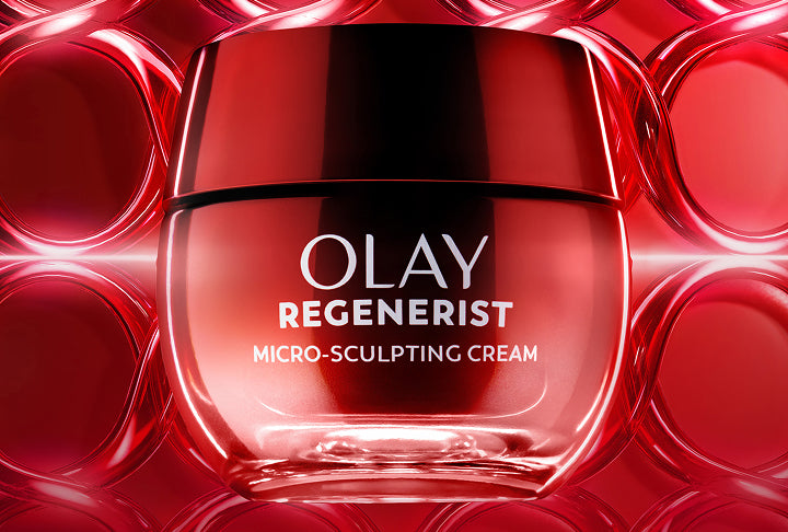 Olay Regenerist micro-sculpting cream jar on a red background